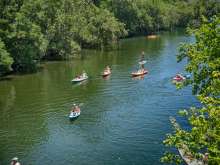Kayaks and SUPs on Barton Creek in Austin