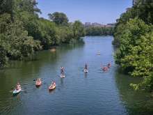 Kayakers and SUPs on Barton Creek in Austin