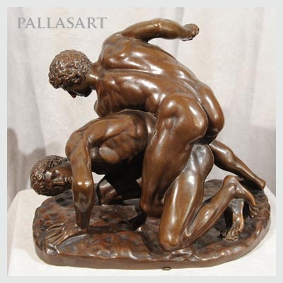 Bronze of the Wrestlers showing a brown patina