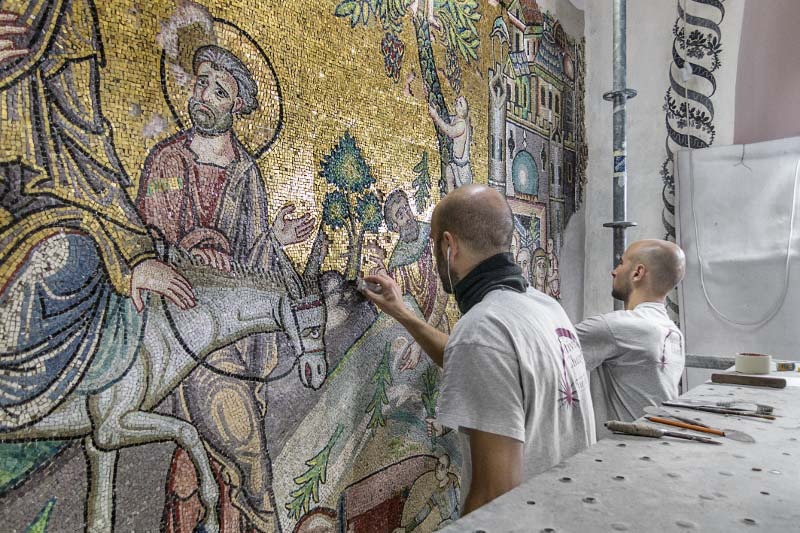 restorers working on mosaics in Bethlehem