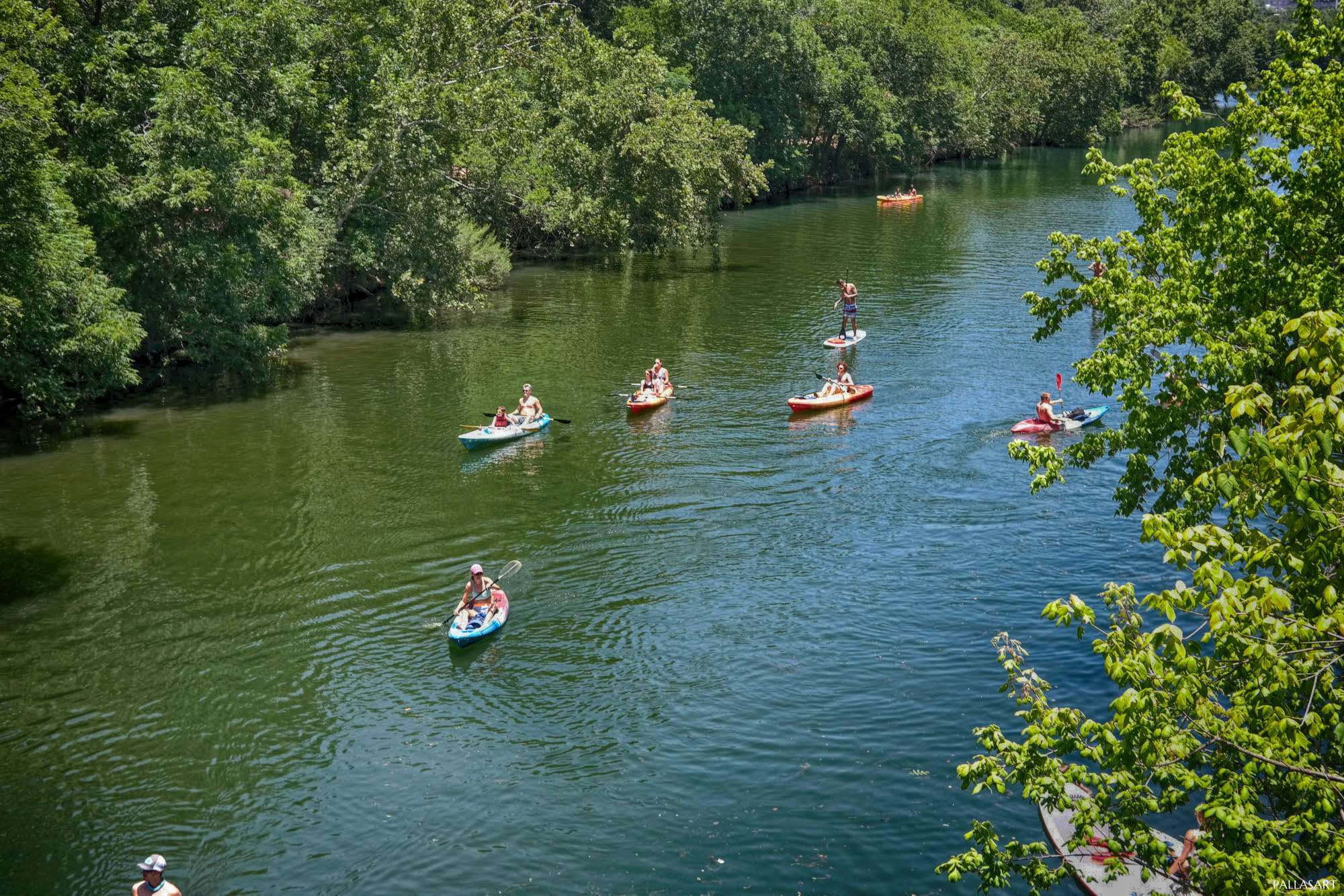 Kayaks and SUPs on Barton Creek in Austin