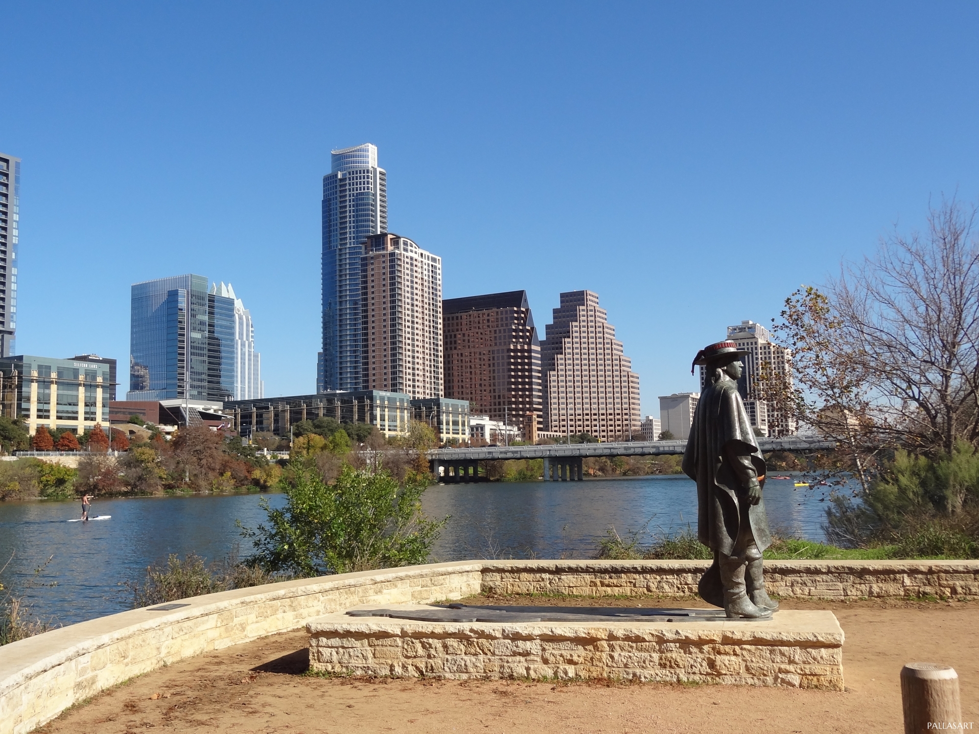 Austin Downtown behind Stevie Ray Vaughan statue