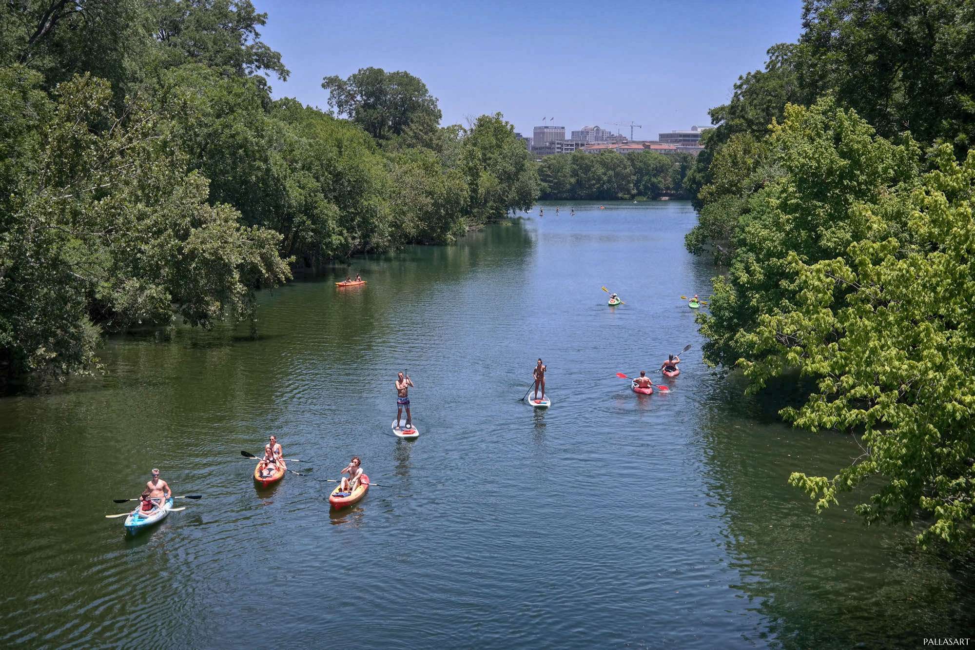 Kayakers and SUPs on Barton Creek in Austin