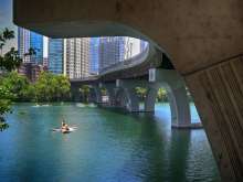 SUP under Pedestrian Bridge over Lady Bird Lake