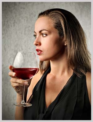 A woman drinking wine